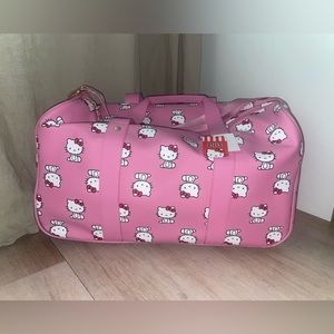HELLO KITTY PINK ROLLING LEATHER DUFFEL LUGGAGE BAG/SUITCASE NWT